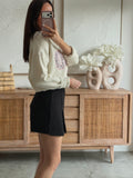 Jupe short noire fendue devant zip côté coupe féminine – NOLI – photo 2